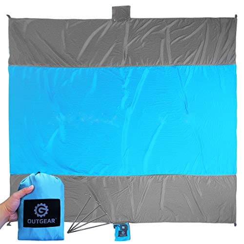 OUTGEAR Sand Free Compact Outdoor Beach Blanket, Oversided 9 X 10 feet Family Pack Portable Picnic Mat, Made of 100% Parachute Nylon, Includes Four Stakes & Sand Anchors, Completely Sand Resistant