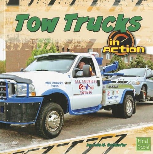 Tow Trucks in Action (First Facts) Paperback – January 1, 2012