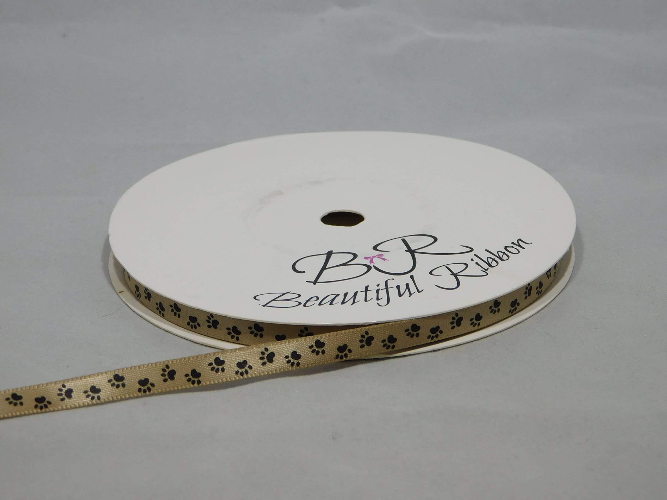 2 metres of 7mm Light Gold with Black Paw Print Satin Ribbon Dog Cat Pet 7 mm