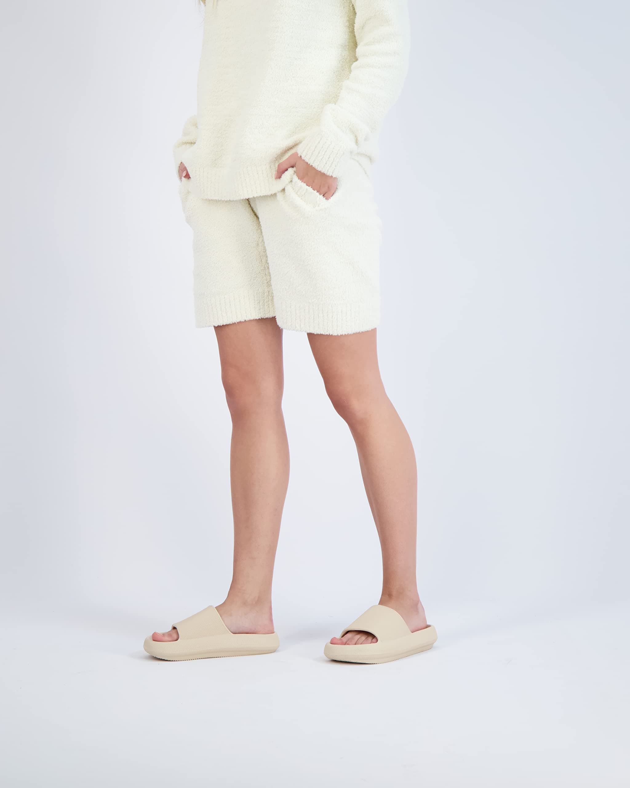 CUSHIONAIRE Feather EVA Slides for Women – Comfortable Slip On Womens Slippers, Indoor Outdoor Shower Shoes, Beach Essential Cloud Slides